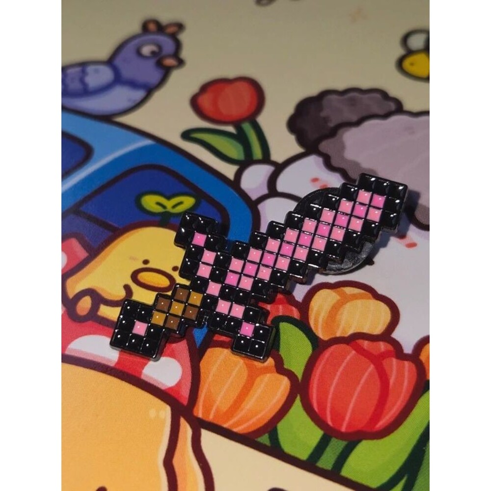 Pink Minecraft enamel pin featuring squares video games